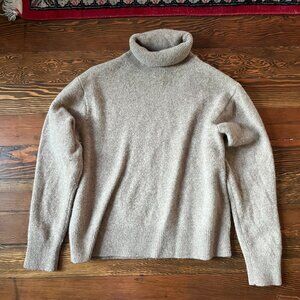 Tan turtleneck Uniqlo sweater